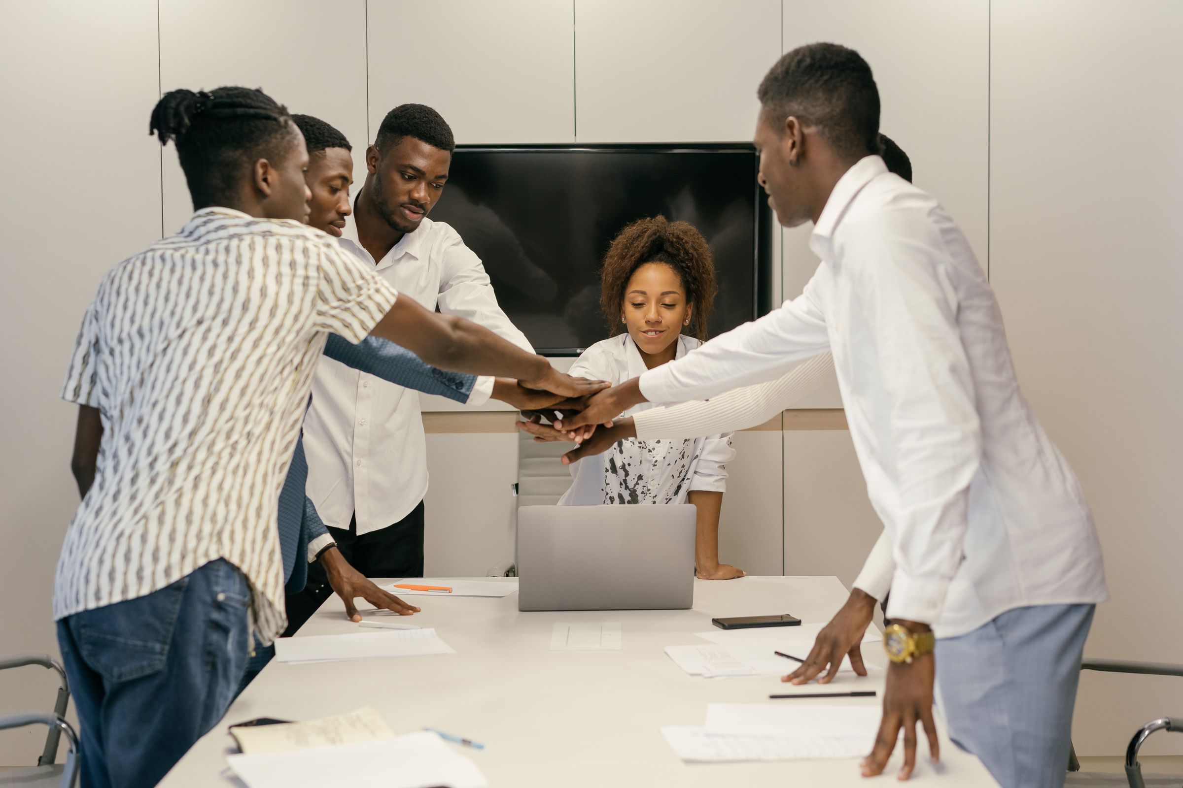 A small team working together around a table
